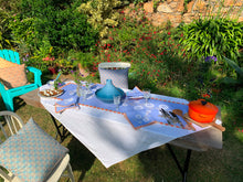 Load image into Gallery viewer, Carrageen Dream Table Runner in orange and beige on a sky blue  background on 100% Irish Linen. 140cm x 40cm. Designbybell.ie