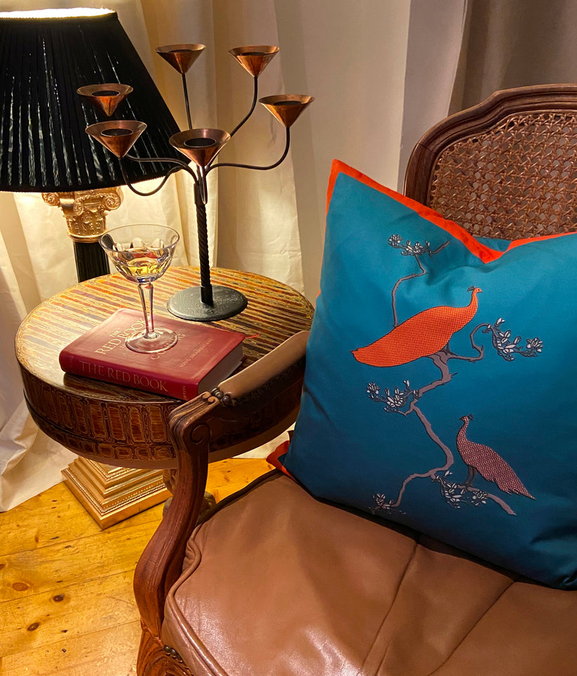 Peacocks Preen Cushion in Turquoise and Orange on Matt Satin by Karen Bell of Designbybell designed pirnted and handmade in Ireland